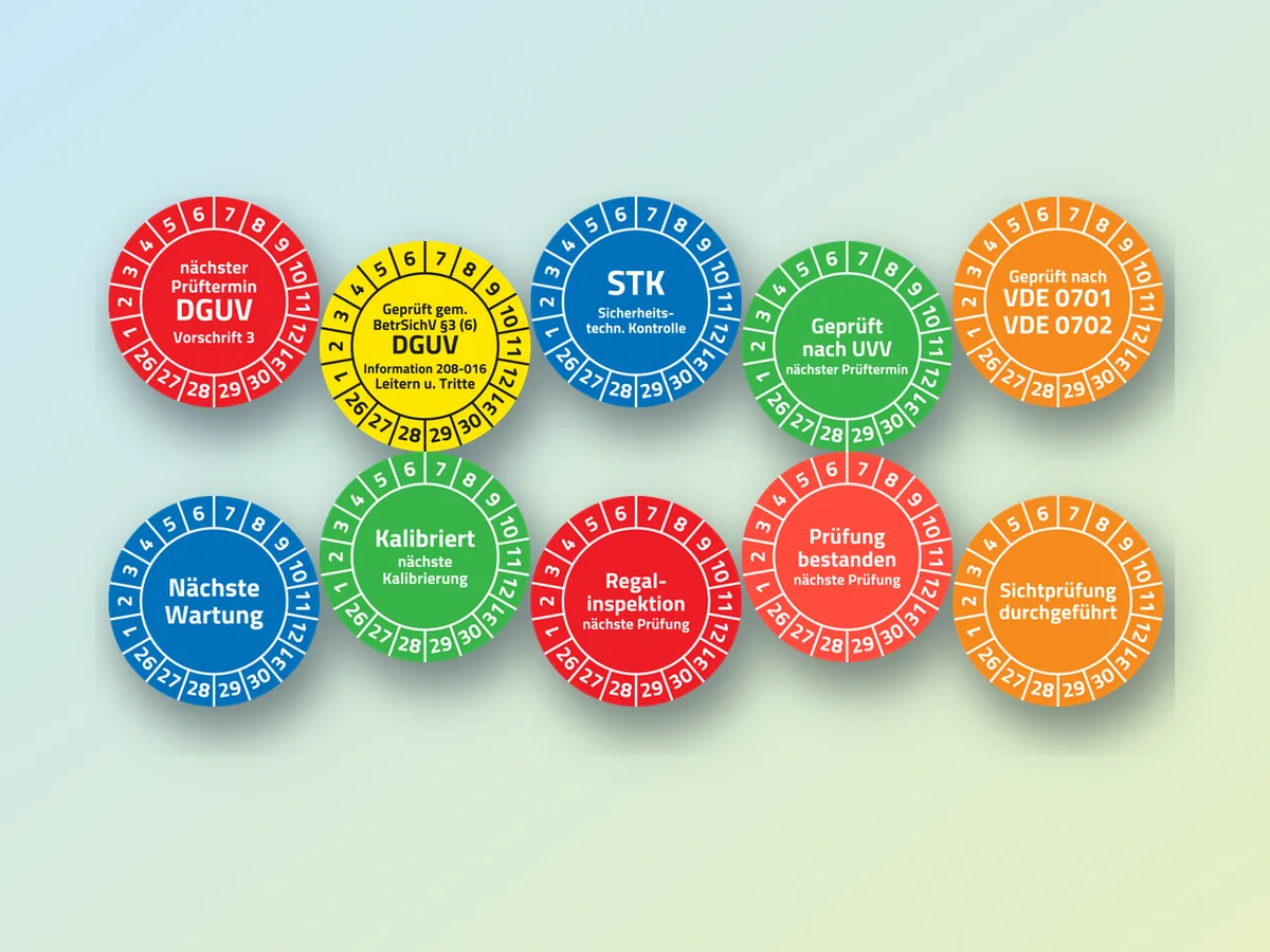Runde Prüfplaketten in verschiedenen Farben und Motiven